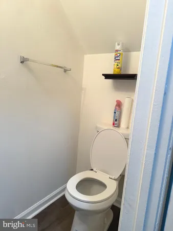 a bathroom with a toilet and a sink