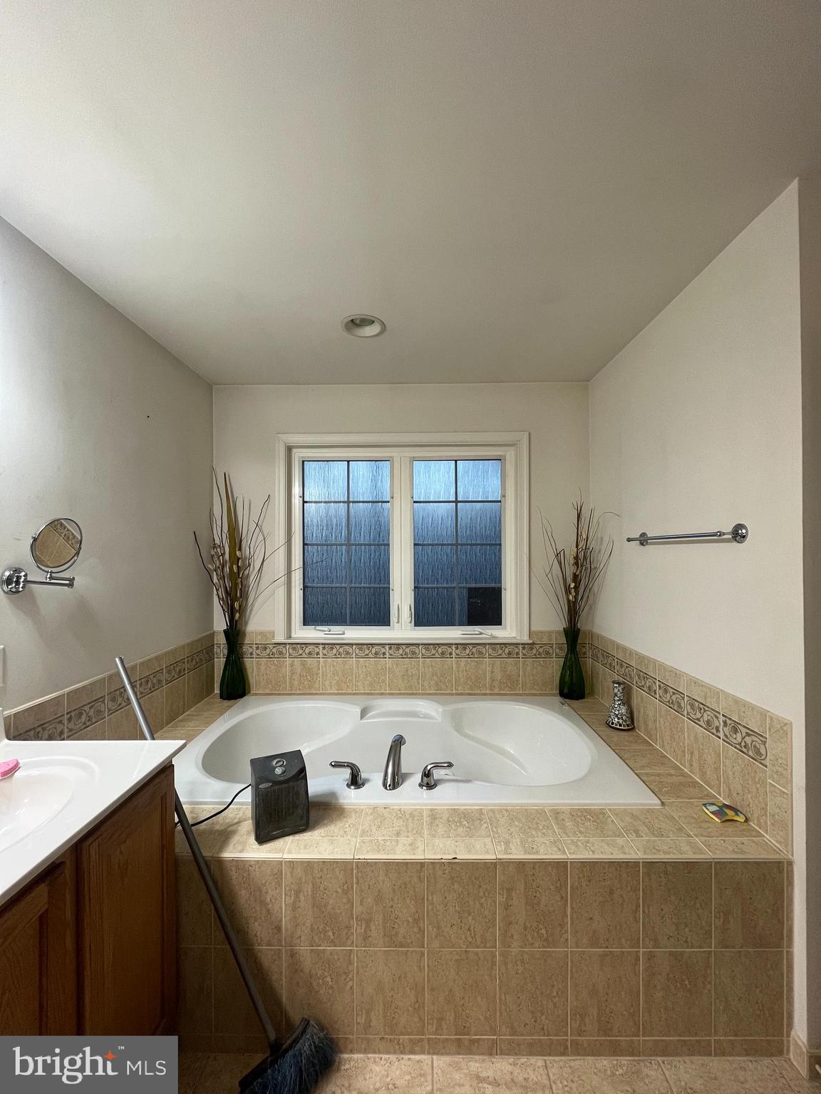 3322 Shrewsbury Road Abingdon, MD 21009 - Photo 11 of 24 a bathroom with a granite countertop sink and a bathtub