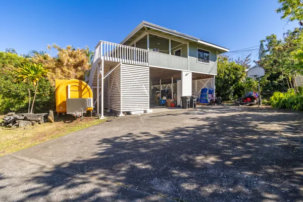 a front view of a house with a outdoor space