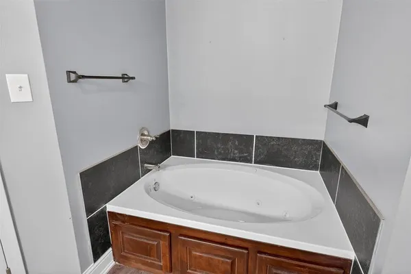 a bathroom with a bathtub