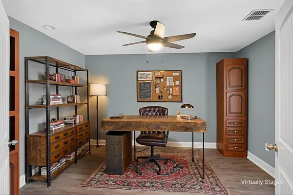 a view of a workspace with furniture