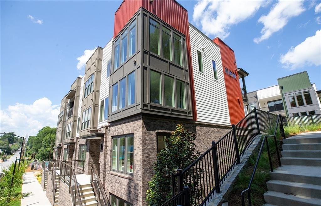 a view of a house with wooden stairs
