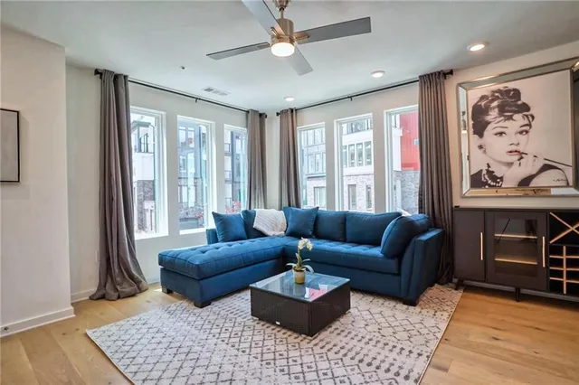 a view of a living room and dining room