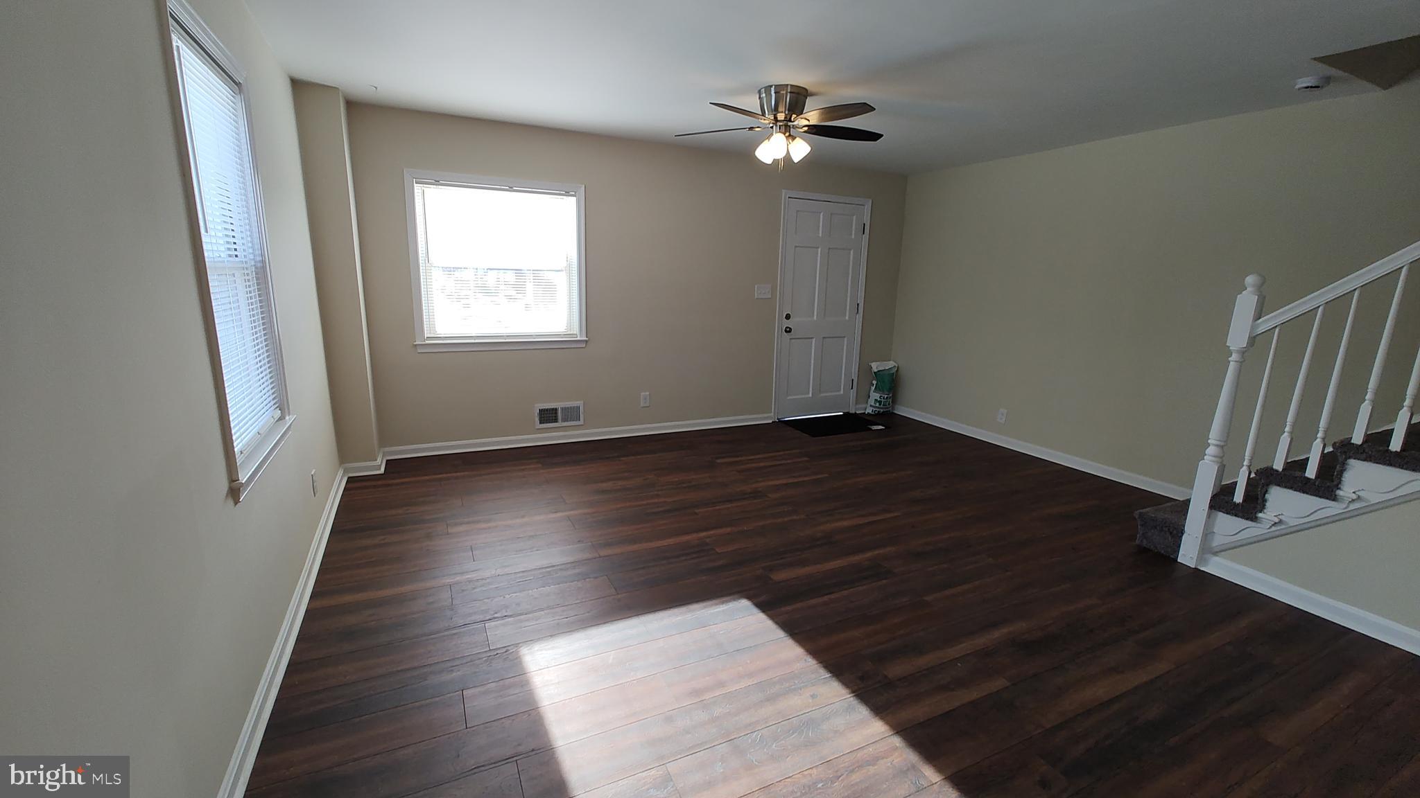 2247 Graythorn Road Middle River, MD 21220 - Photo 11 of 29 a view of an empty room with wooden floor and a window