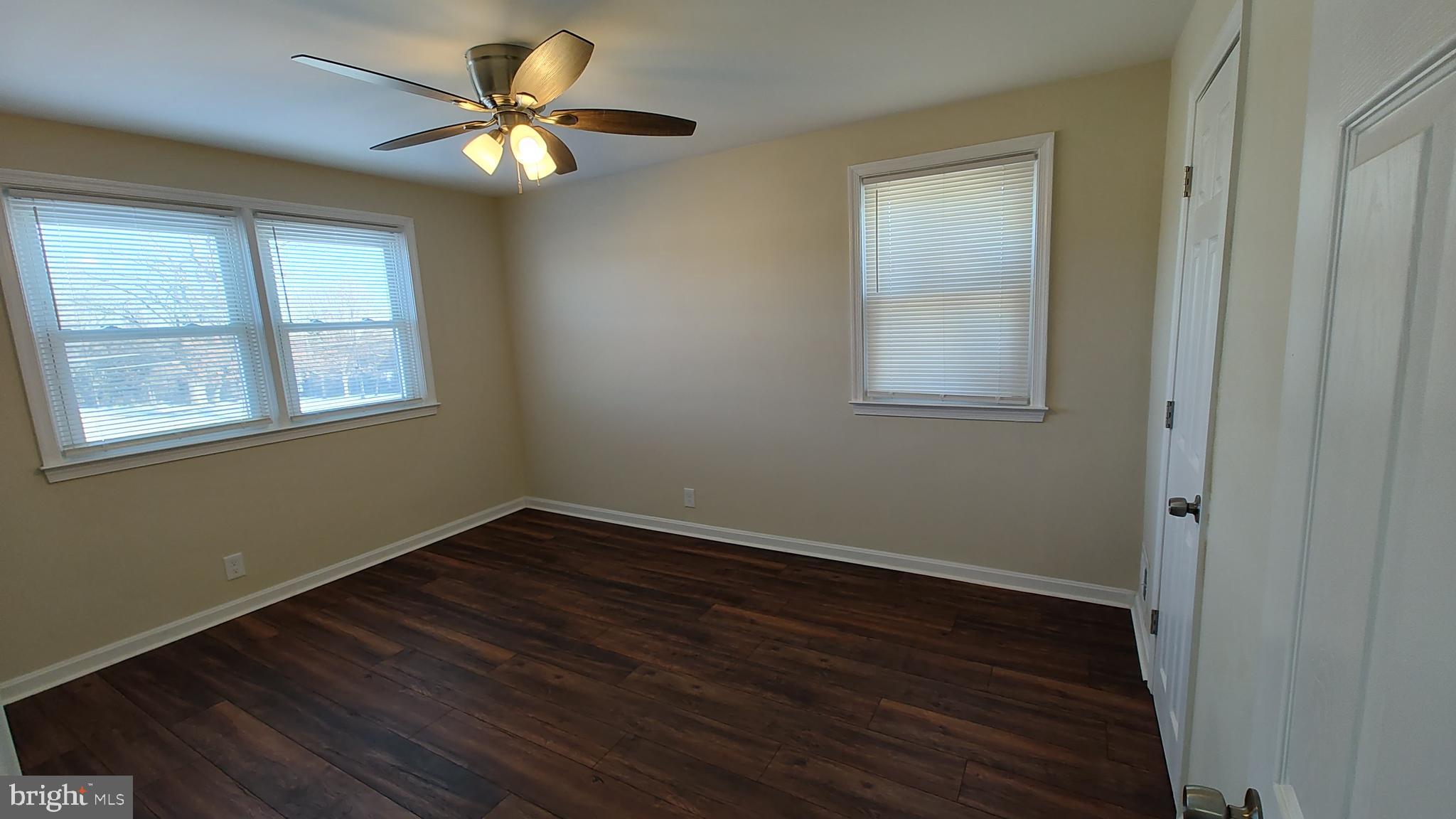 2247 Graythorn Road Middle River, MD 21220 - Photo 13 of 29 a view of an empty room with wooden floor and a window