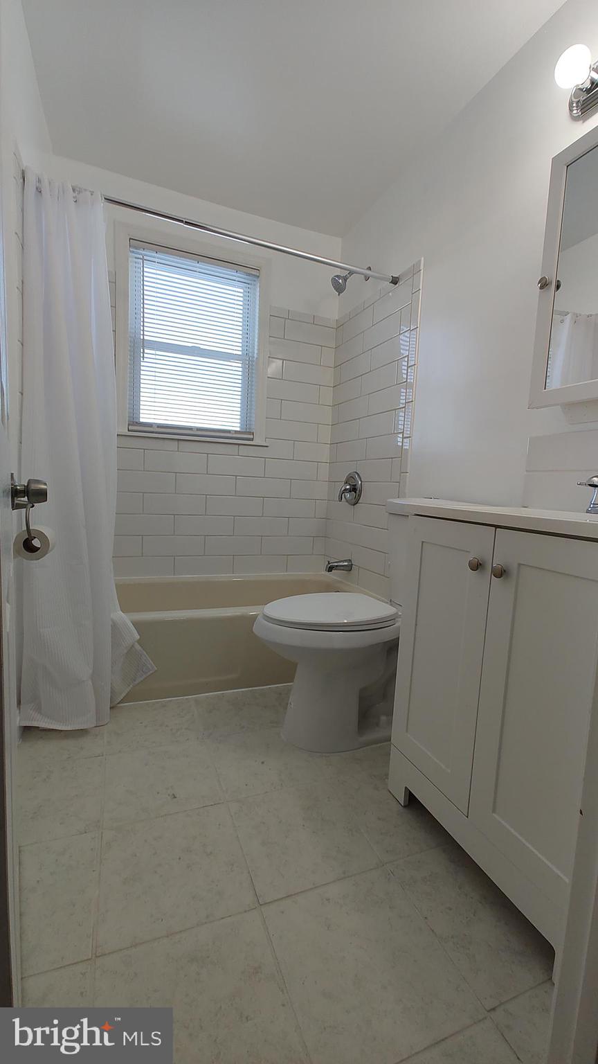 2247 Graythorn Road Middle River, MD 21220 - Photo 16 of 29 a bathroom with a sink a toilet and shower