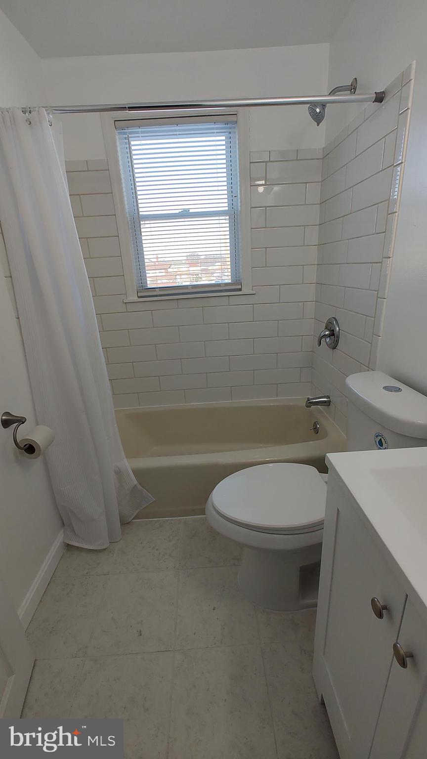 2247 Graythorn Road Middle River, MD 21220 - Photo 17 of 29 a bathroom with a sink a toilet and shower