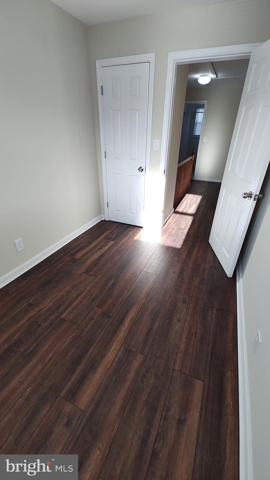 2247 Graythorn Road Middle River, MD 21220 - Photo 23 of 29 wooden floor in an empty room