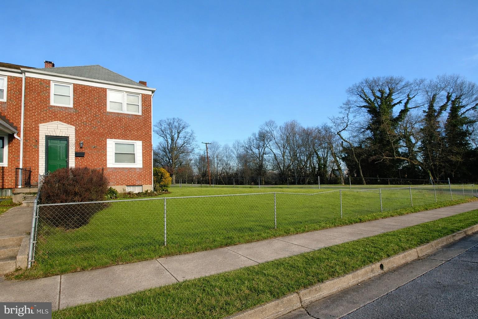 2247 Graythorn Road Middle River, MD 21220 - Photo 27 of 29 a view of a big house with a big yard and large trees