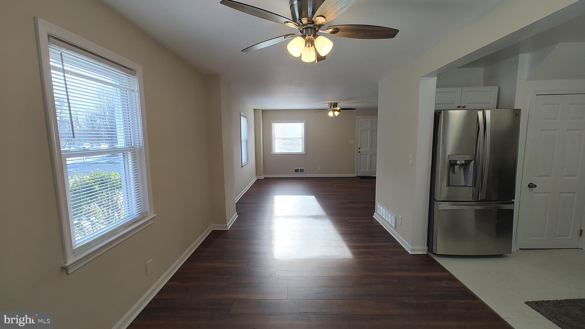 2247 Graythorn Road Middle River, MD 21220 - Photo 5 of 29 a view of empty room with wooden floor and fan