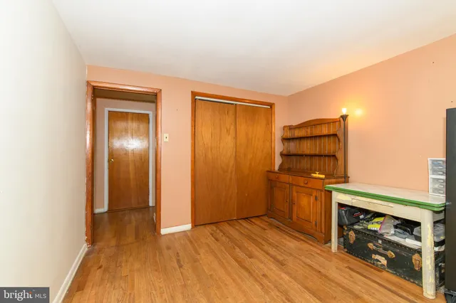 a kitchen with stainless steel appliances a refrigerator and a stove top oven