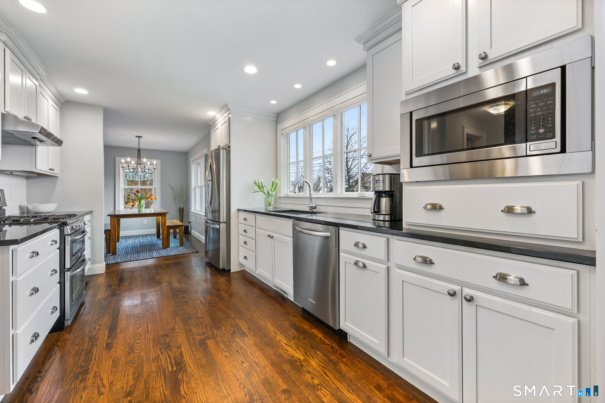 693 South Benson Road Fairfield, CT 06824 - Photo 40 of 40 Open floor plan kitchen with flow to dining room