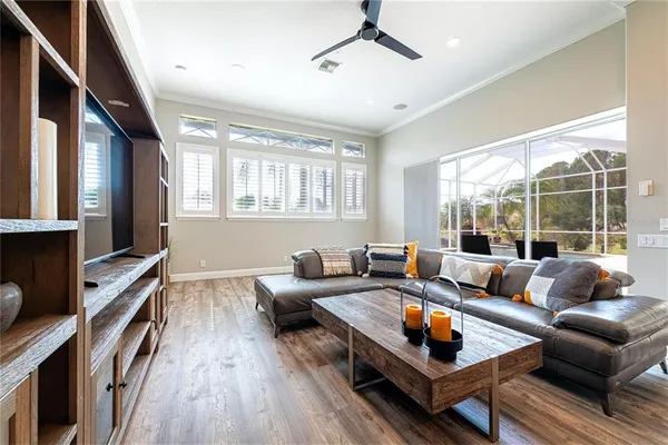 a bedroom with a bed and a table