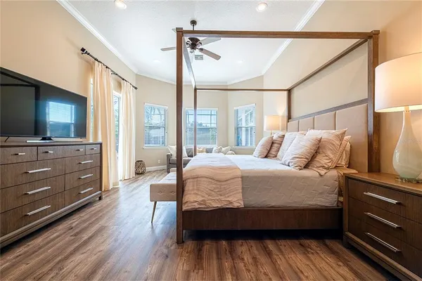 a view of a kitchen with a table and a chair