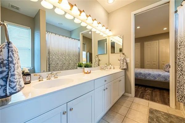 a view of a swimming pool with a patio