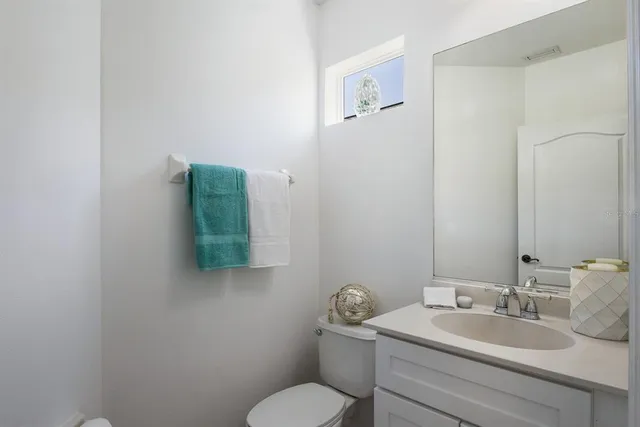 a kitchen with a stove and cabinets