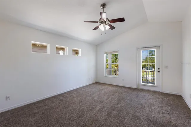 a view of a porch with wooden floor