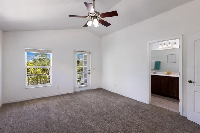 a bathroom with a double vanity sink mirror and toilet