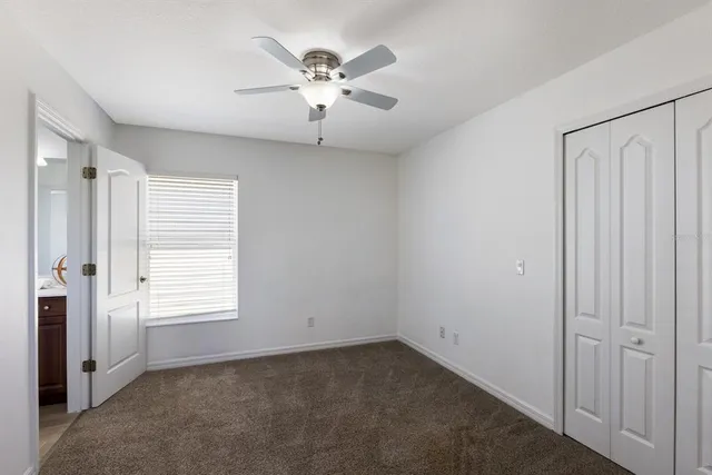 an empty room with a bathroom