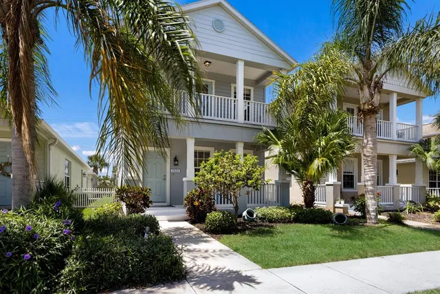 a view of a swimming pool with lounge chairs