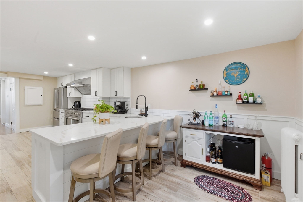 12 Salem Street, Unit 2 Haverhill, MA 01835 - Photo 13 of 34 a kitchen with a sink and cabinets