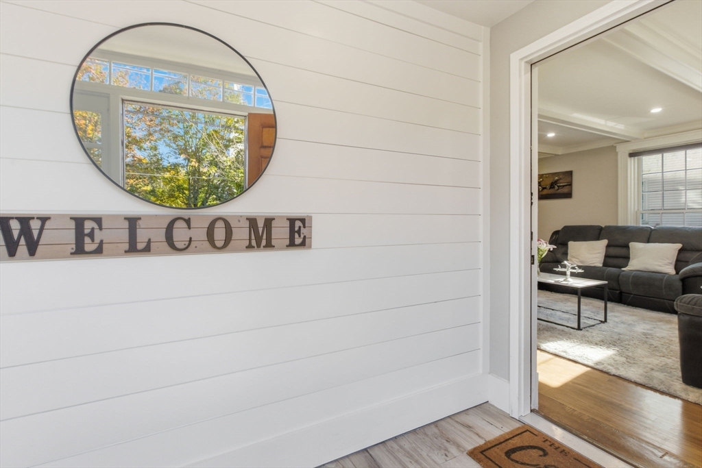 12 Salem Street, Unit 2 Haverhill, MA 01835 - Photo 2 of 34 an entryway view with wooden floor and glass windows