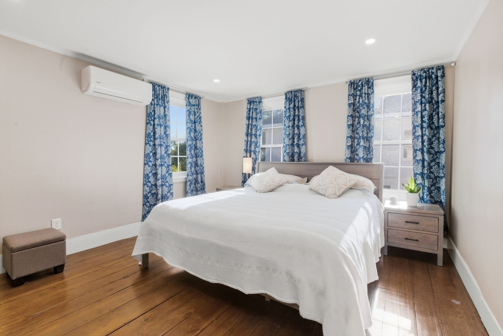 12 Salem Street, Unit 2 Haverhill, MA 01835 - Photo 21 of 34 a bedroom with a bed and a large window