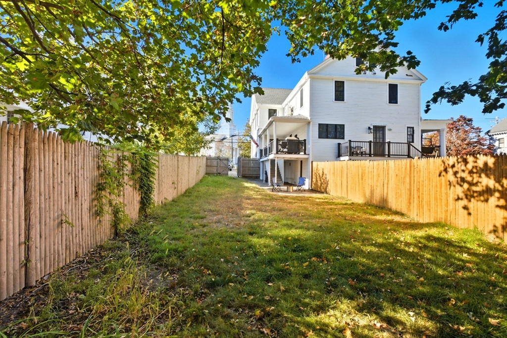 12 Salem Street, Unit 2 Haverhill, MA 01835 - Photo 31 of 34 a view of a house with a yard