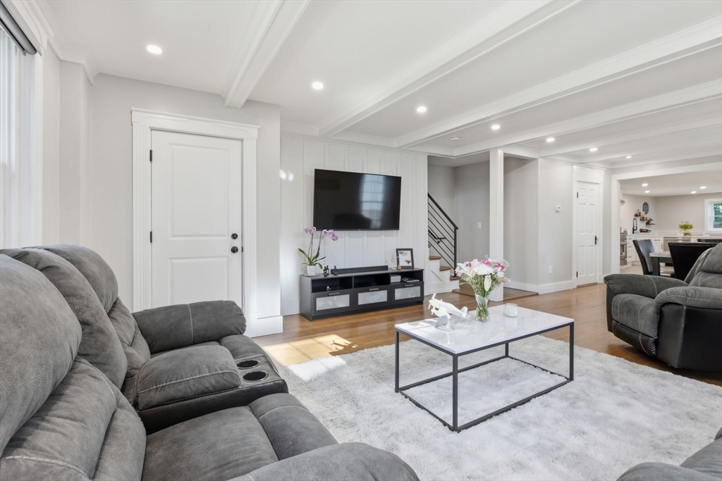 12 Salem Street, Unit 2 Haverhill, MA 01835 - Photo 4 of 34 a living room with furniture and a flat screen tv