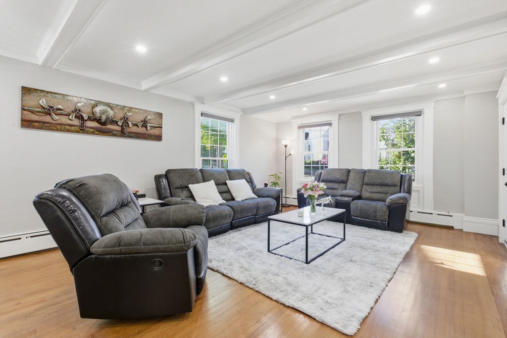 12 Salem Street, Unit 2 Haverhill, MA 01835 - Photo 6 of 34 a living room with furniture and a couch