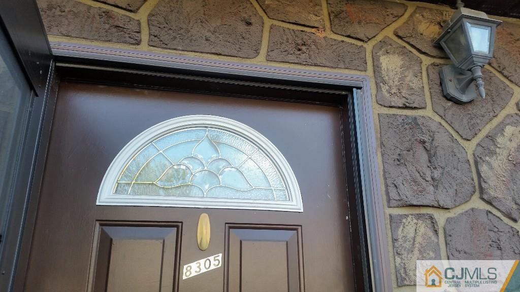 8305 Hana Road Edison, NJ 08817 - Photo 1 of 20 a closeup view of a fireplace