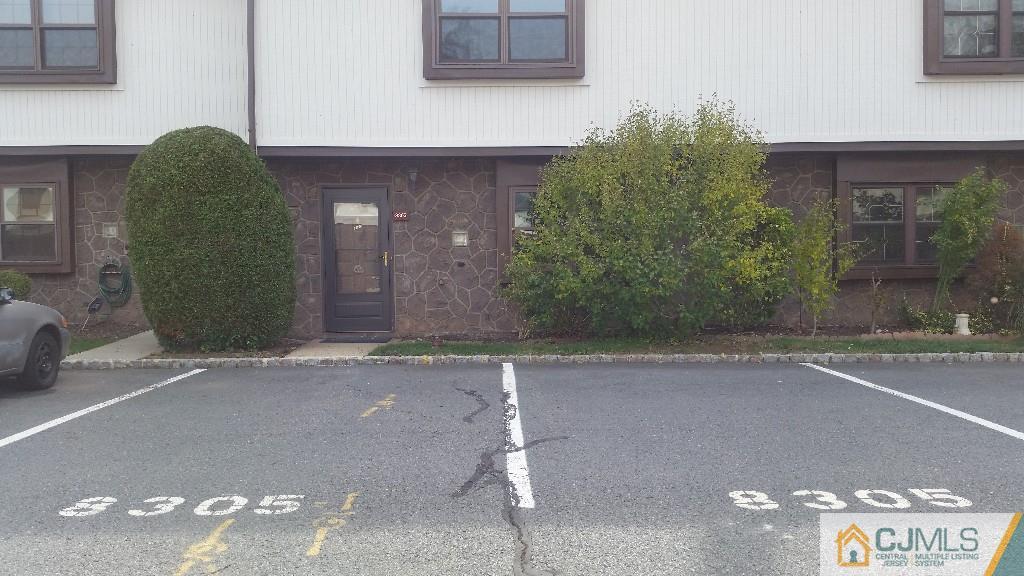 8305 Hana Road Edison, NJ 08817 - Photo 2 of 20 a front view of a house with parking space