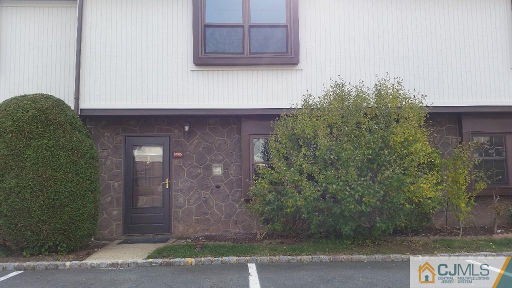 8305 Hana Road Edison, NJ 08817 - Photo 3 of 20 a front view of a house with a yard