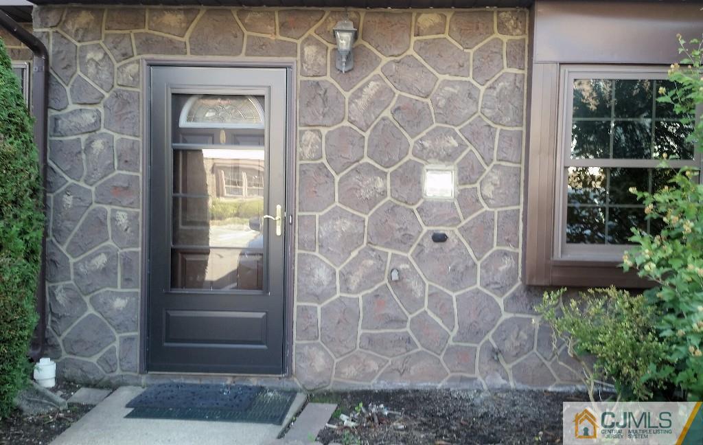 8305 Hana Road Edison, NJ 08817 - Photo 4 of 20 a front view of a house with a shower