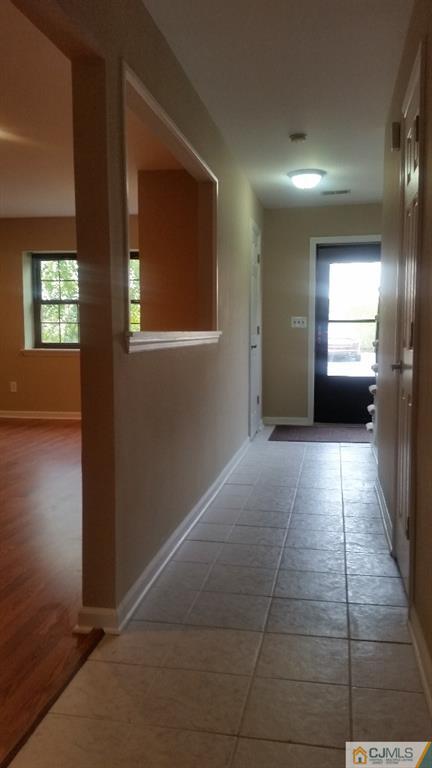 8305 Hana Road Edison, NJ 08817 - Photo 8 of 20 a view of livingroom with windows