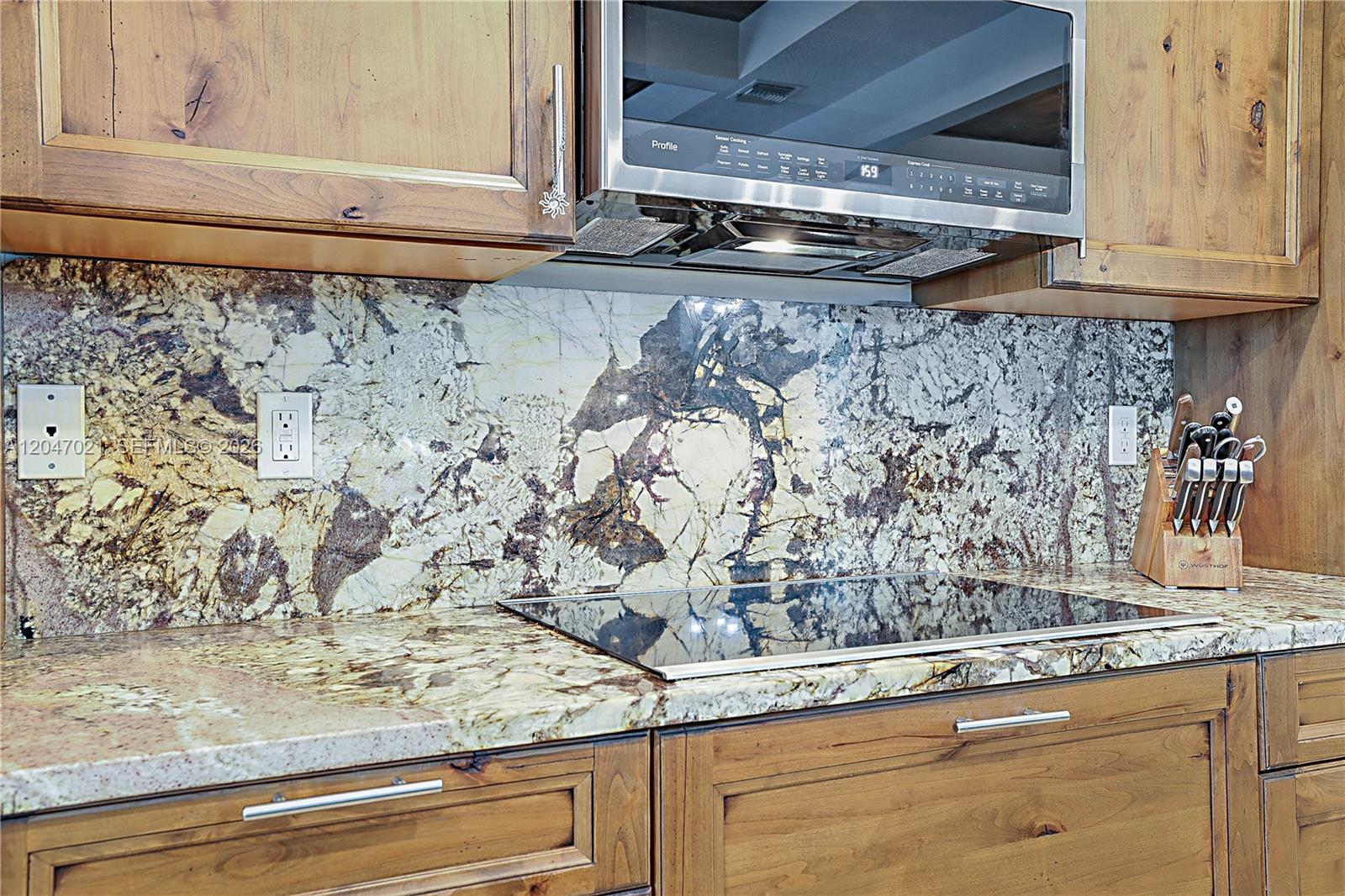 12127 154th Road North Jupiter, FL 33478 - Photo 19 of 67 Granite Backsplash
