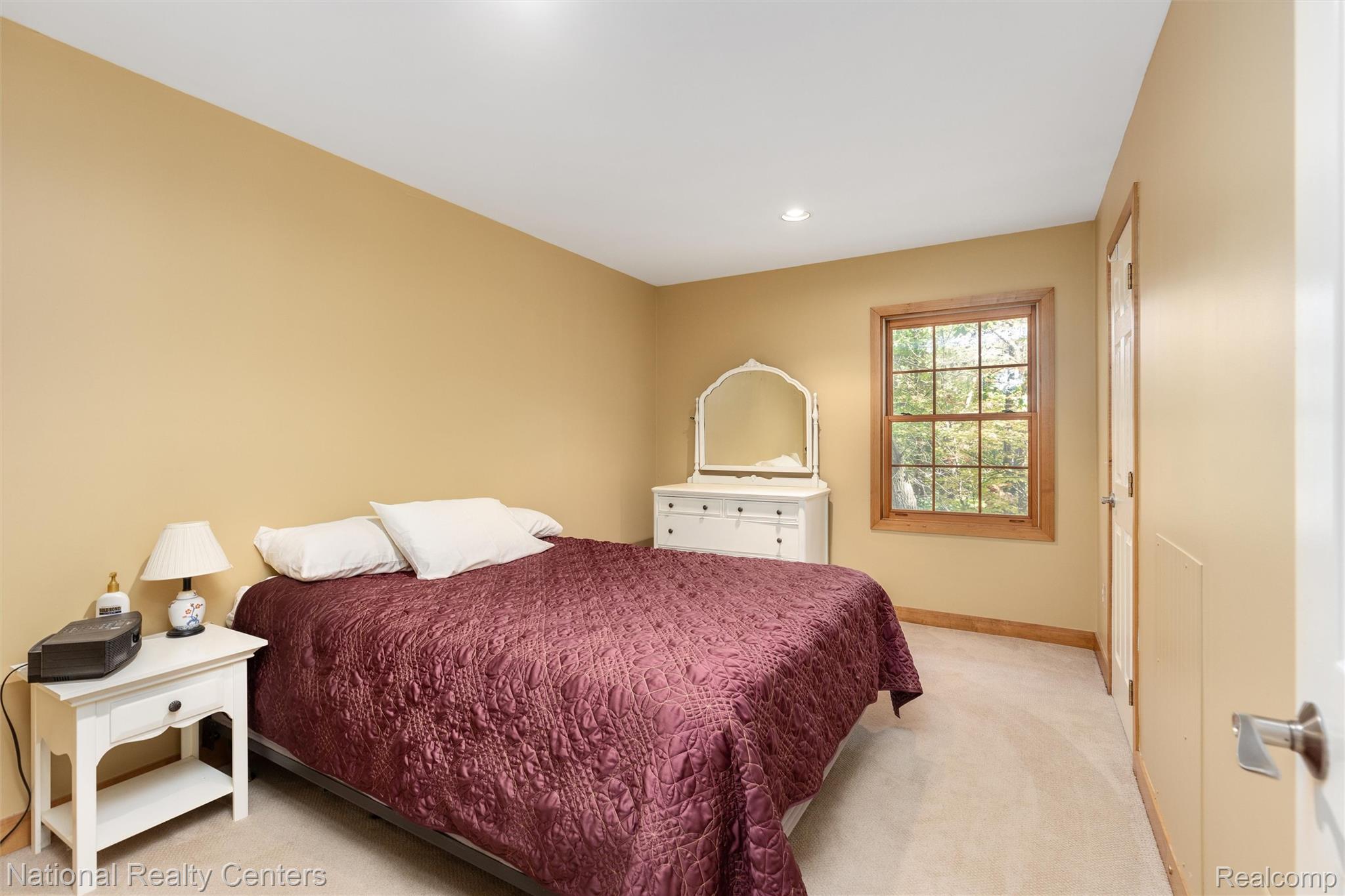 2322 Addaleen Road Highland, MI 48357 - Photo 28 of 54 Bedroom with light carpet and recessed lighting