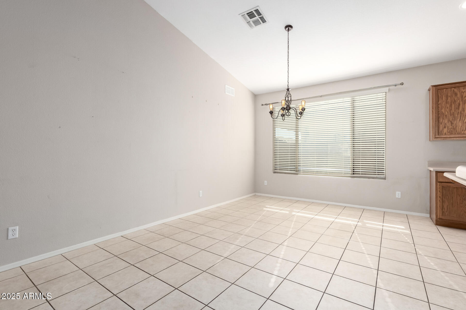 939 South Roca Street Gilbert, AZ 85296 - Photo 8 of 40 a view of an empty room and window