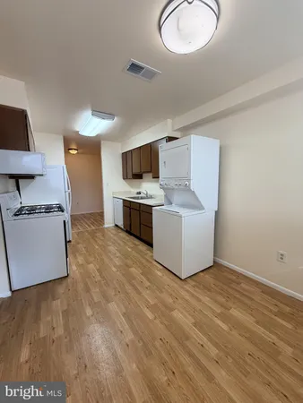 a living room with a couch and a flat screen tv