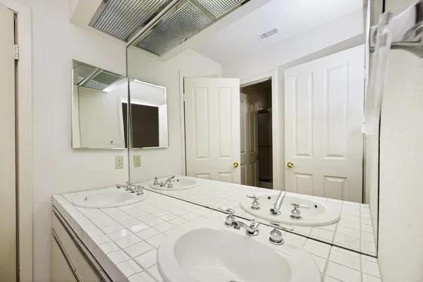 a bathroom with a shower and a toilet