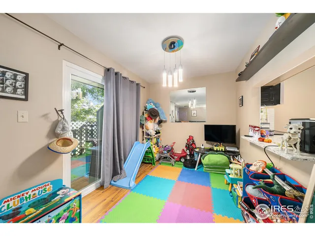 a room with musical instruments and air hockey table
