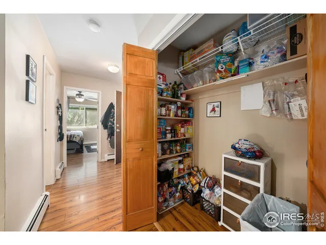 a room with furniture and a book shelf