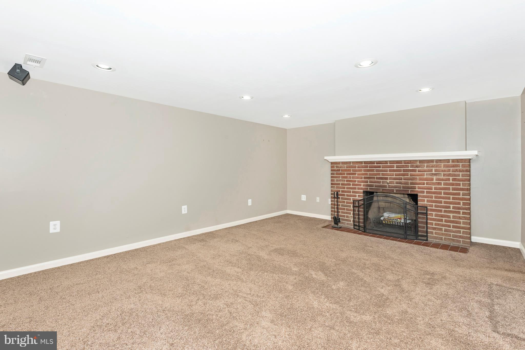 7311 Ridge Road Frederick, MD 21702 - Photo 24 of 30 an empty room with fireplace