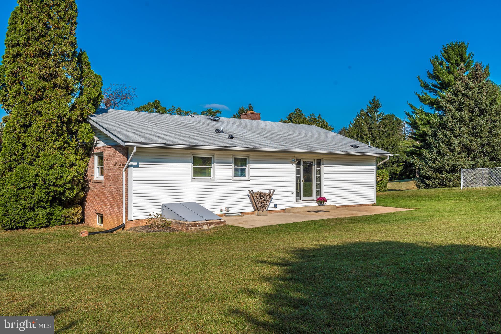 7311 Ridge Road Frederick, MD 21702 - Photo 27 of 30 a view of a house with a yard