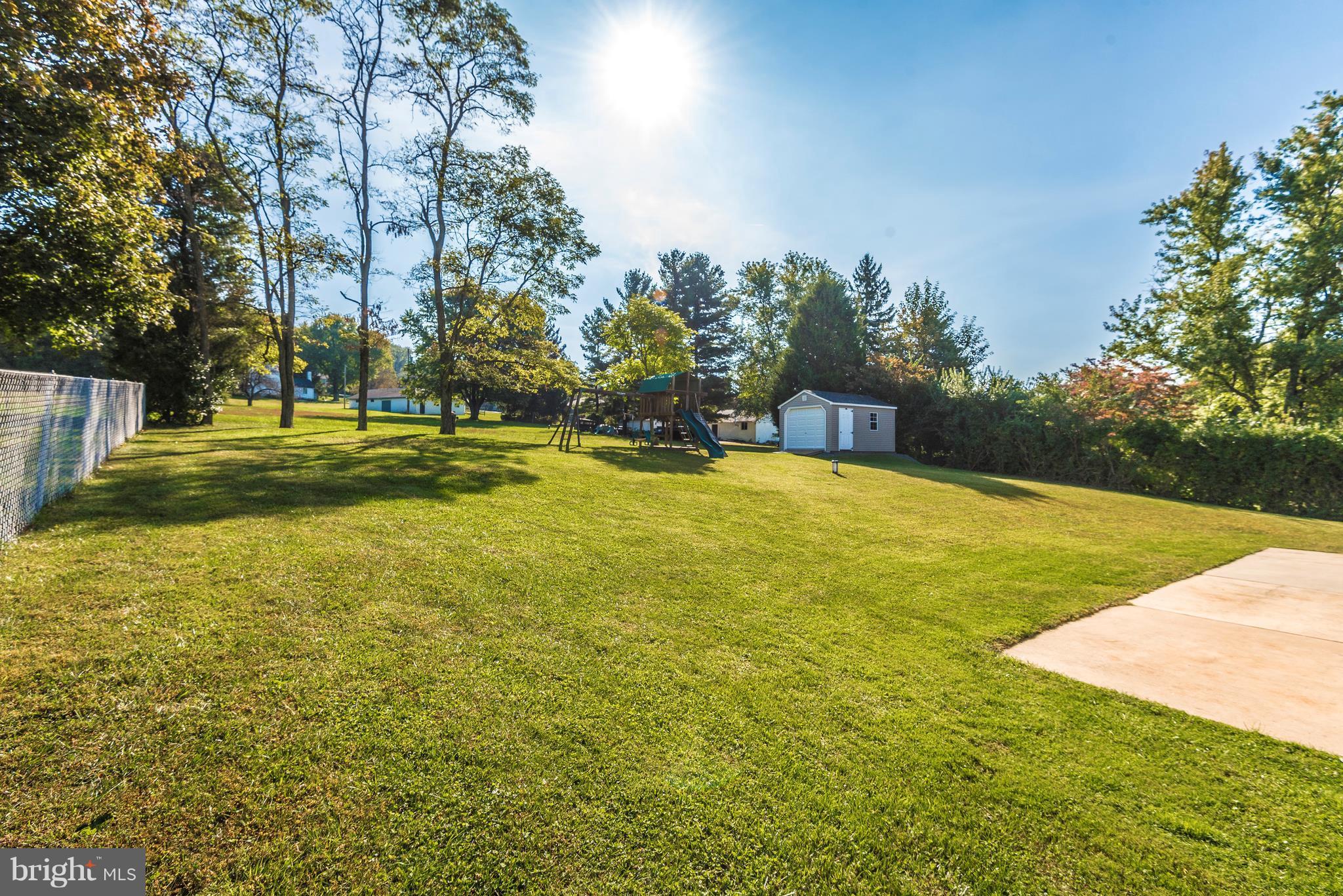 7311 Ridge Road Frederick, MD 21702 - Photo 28 of 30 a view of a swimming pool with an outdoor space and seating area