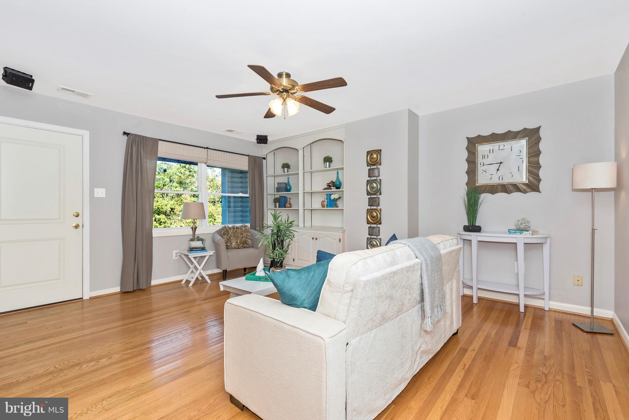 7311 Ridge Road Frederick, MD 21702 - Photo 6 of 30 a living room with furniture and a wooden floor