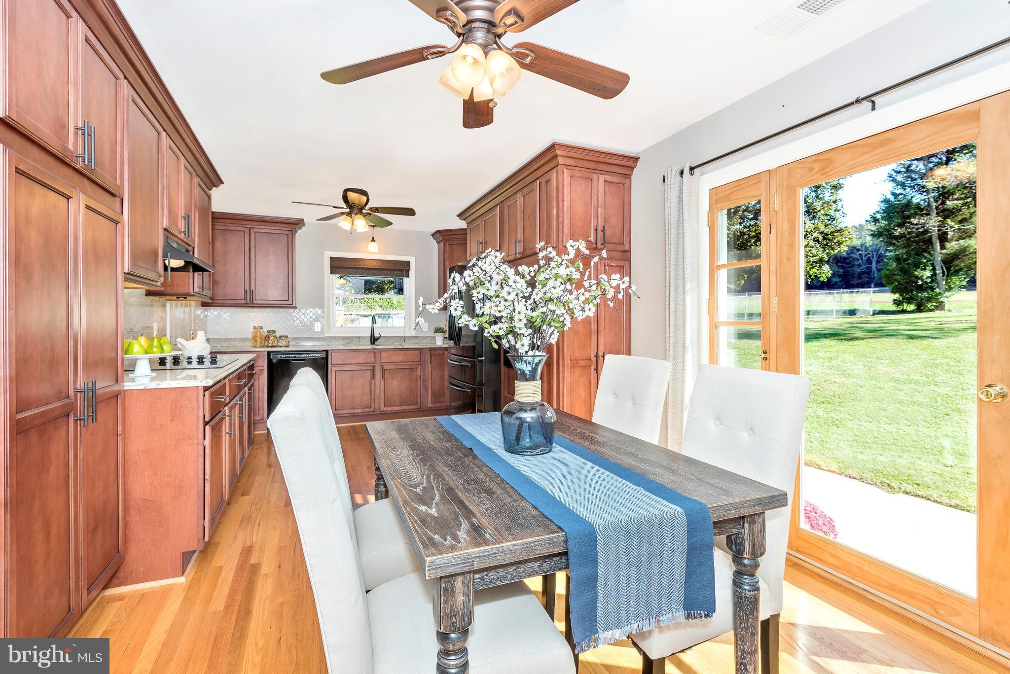 7311 Ridge Road Frederick, MD 21702 - Photo 8 of 30 a view of a dining room with furniture window and outside view