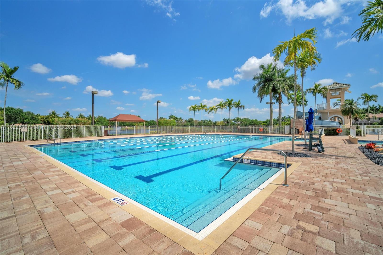 942 Lavender Circle Weston, FL 33327 - Photo 59 of 68 a view of a yard and swimming pool