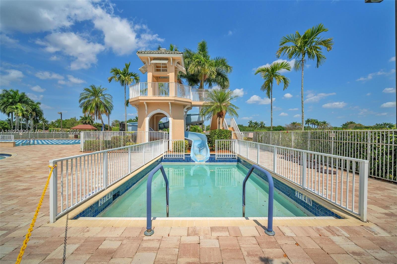 942 Lavender Circle Weston, FL 33327 - Photo 60 of 68 a view of a house with a swimming pool