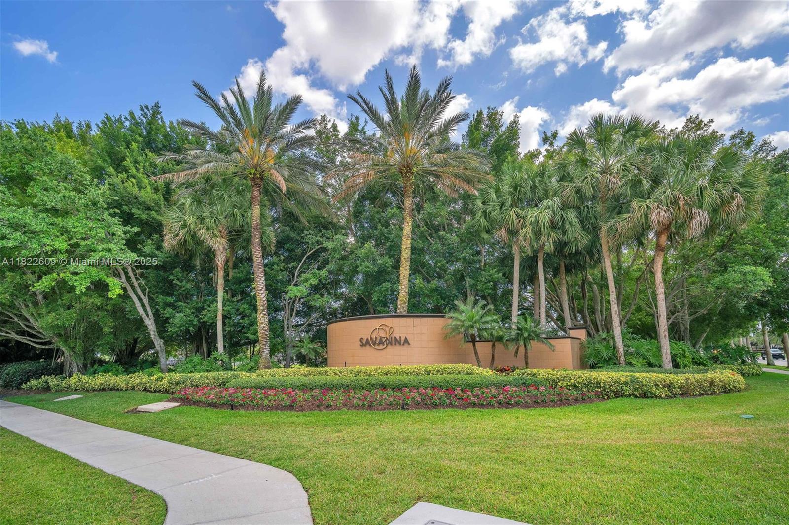 942 Lavender Circle Weston, FL 33327 - Photo 65 of 68 a view of a park with large trees and a barn in it